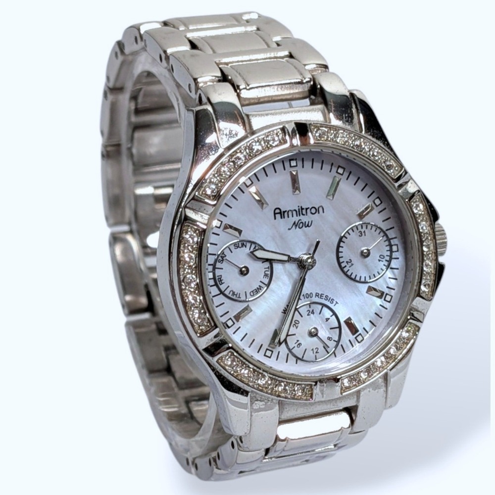 Armitron Now Watch Silver Tone Mother of Pearl Crystal Bezel Water Resistant